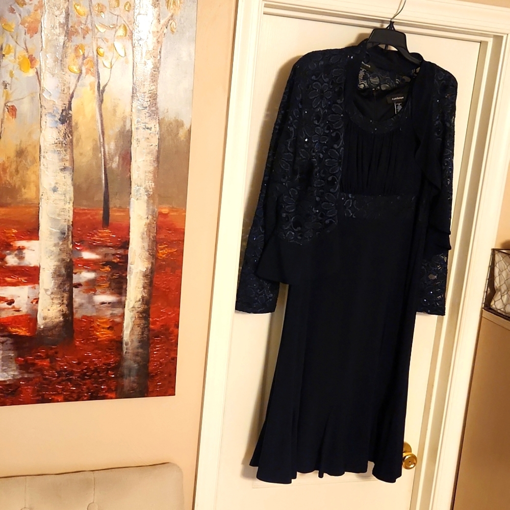 This is a beautiful sequence navy blue jacket dress by R&M Richard's size 14 $45